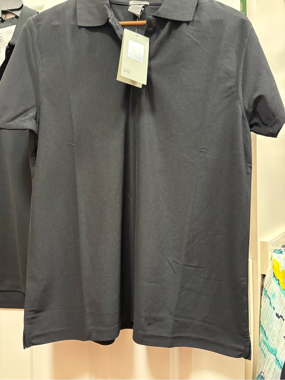 Women’s, Black Polo shirt. XL New with tags